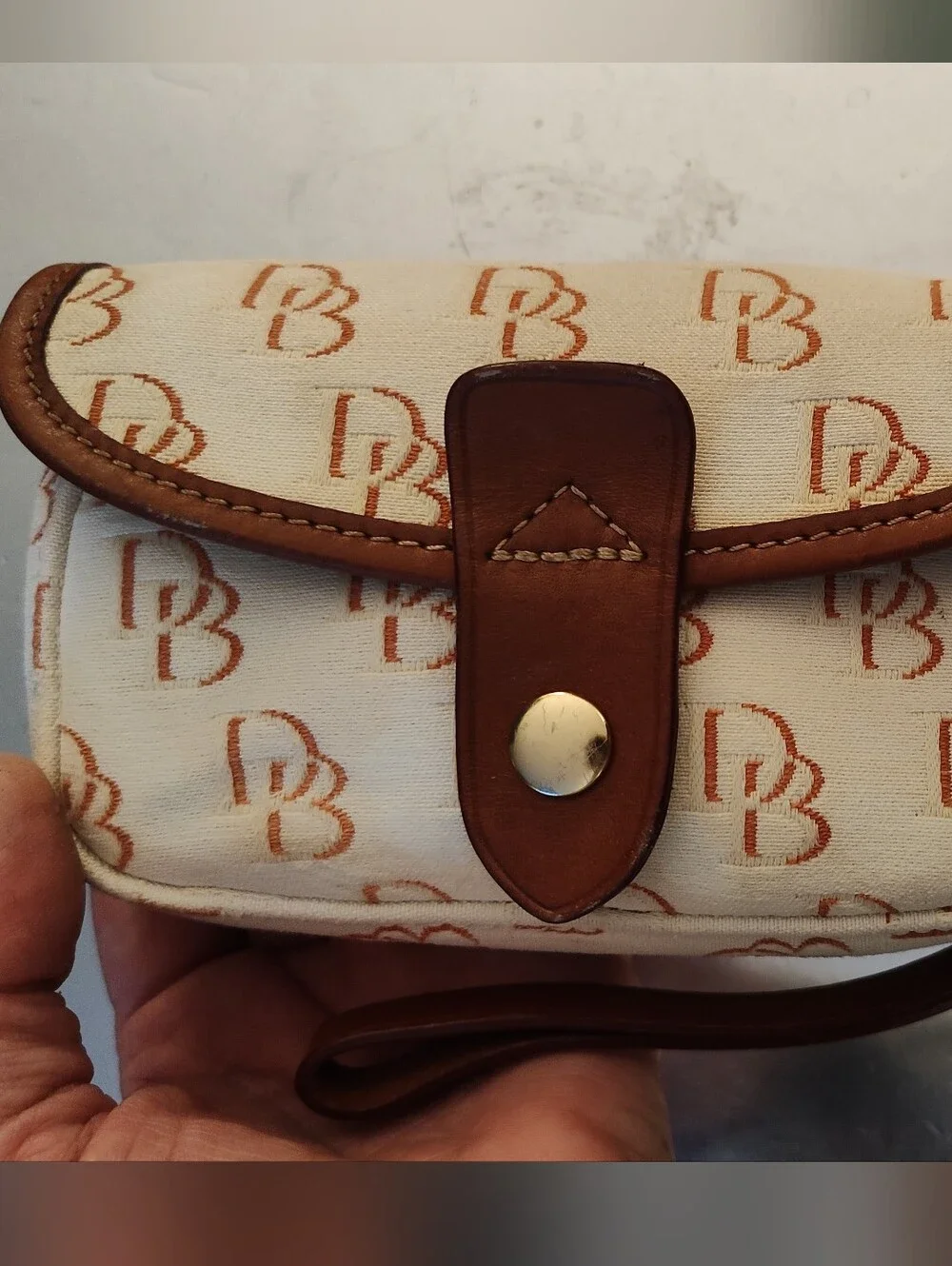 Dooney Bourke Vintage Wristlet Snap Repeating Logo, Cream/Tan